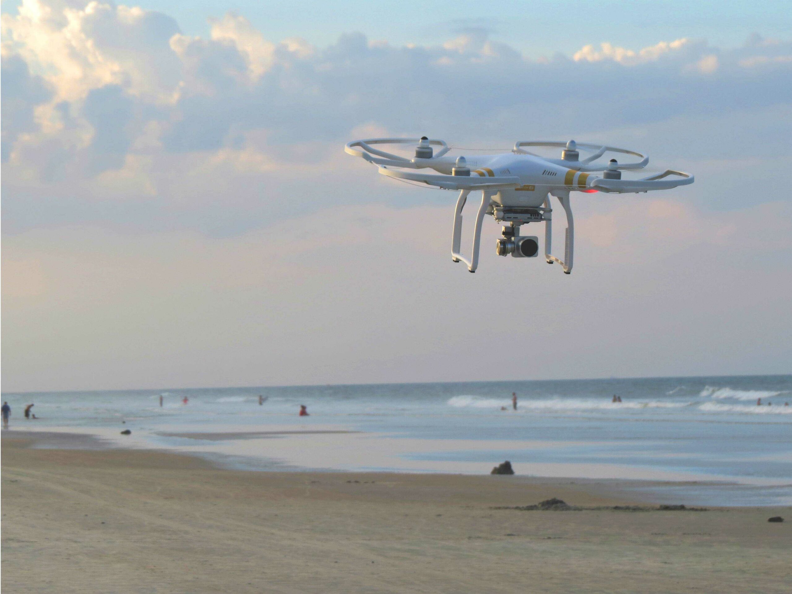drone flying over the beach