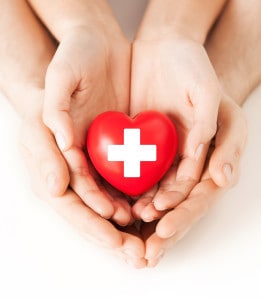 hands holding healthcare heart